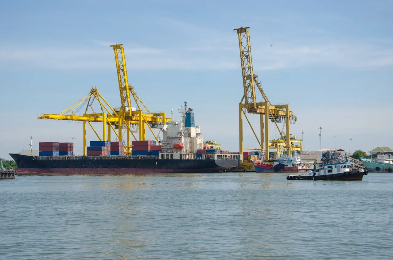 Offshore support vessels and cranes at a marine terminal